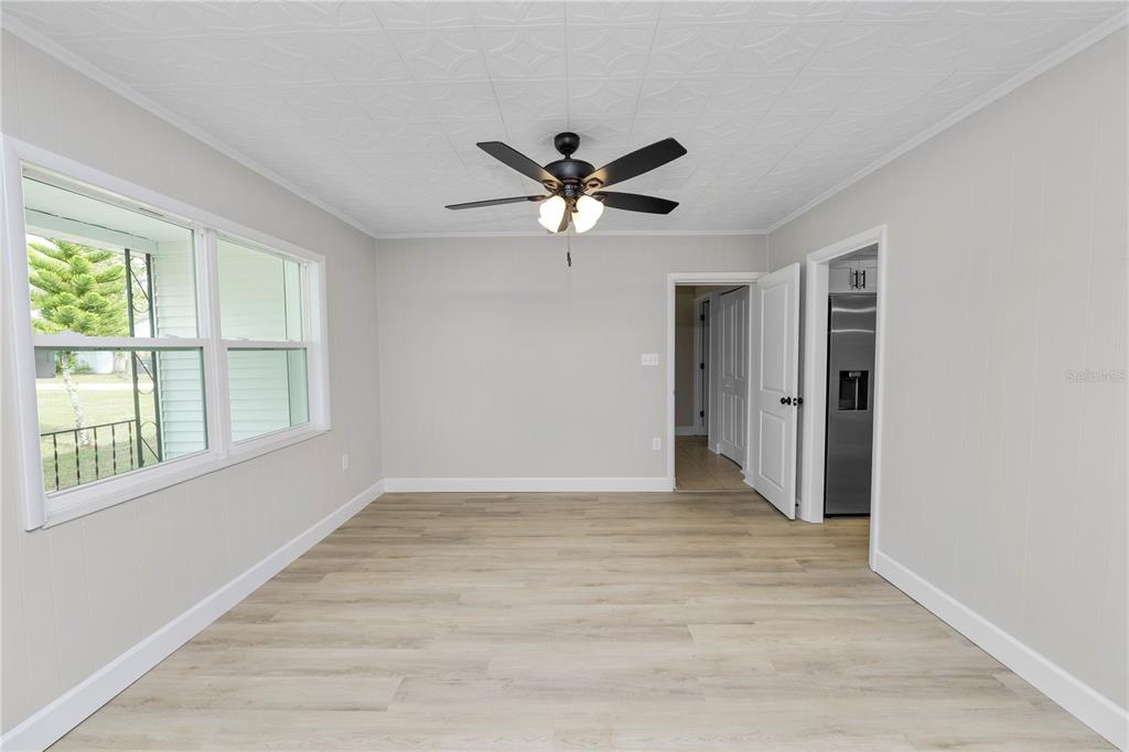 5105 Hayes Road Lakeland, FL 33811 - Photo 10 of 43 wooden floor in an empty room with a window