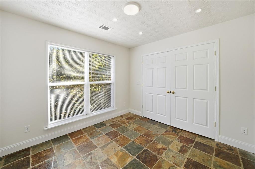 1512 Upper Sassafras Road Jasper, GA 30143 - Photo 31 of 35 an empty room with a window