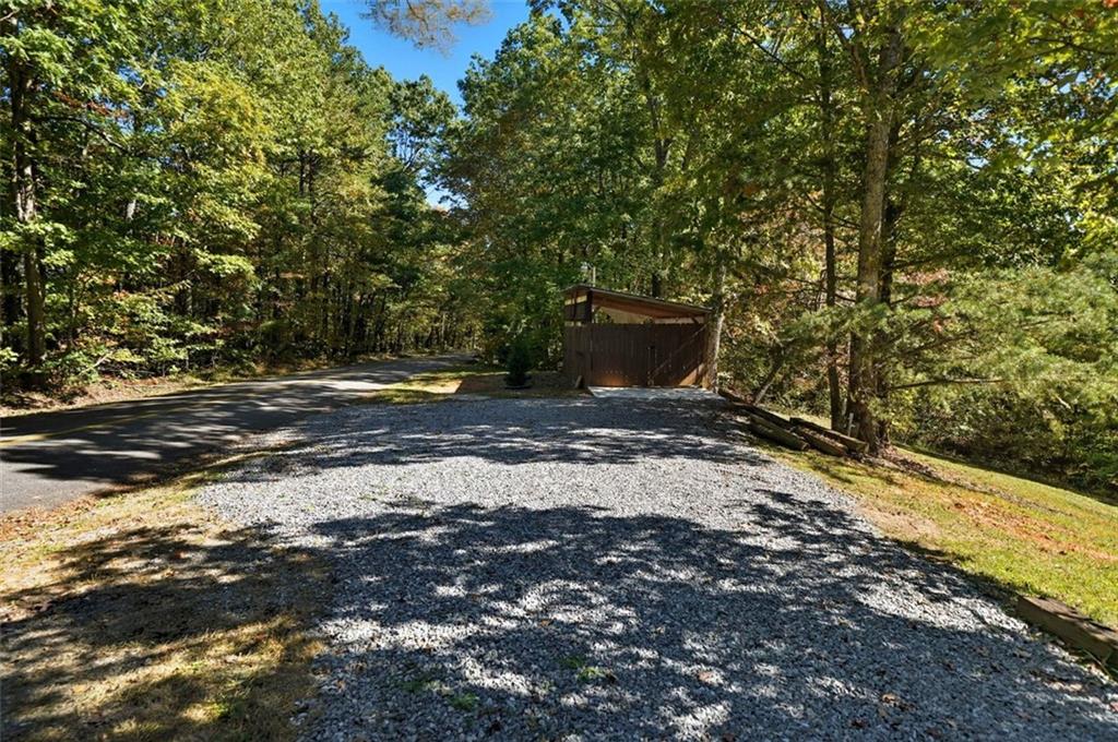 1512 Upper Sassafras Road Jasper, GA 30143 - Photo 34 of 35 a view of a backyard of the house