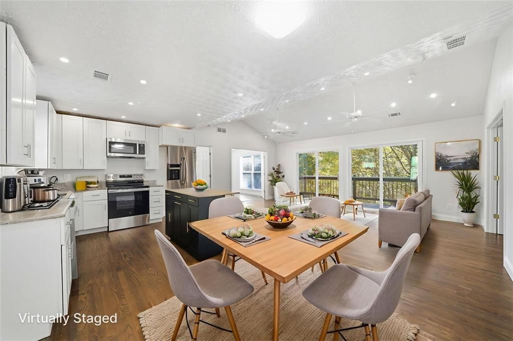 1512 Upper Sassafras Road Jasper, GA 30143 - Photo 10 of 35 a large kitchen with a table and chairs