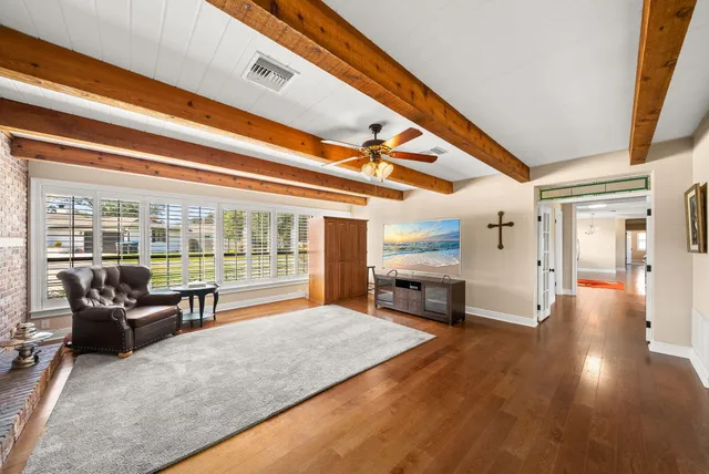 a kitchen with a sink stove and refrigerator