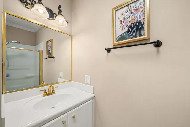 a living room with furniture and floor to ceiling windows