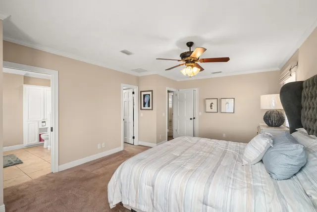 a view of a lake with couches and city view