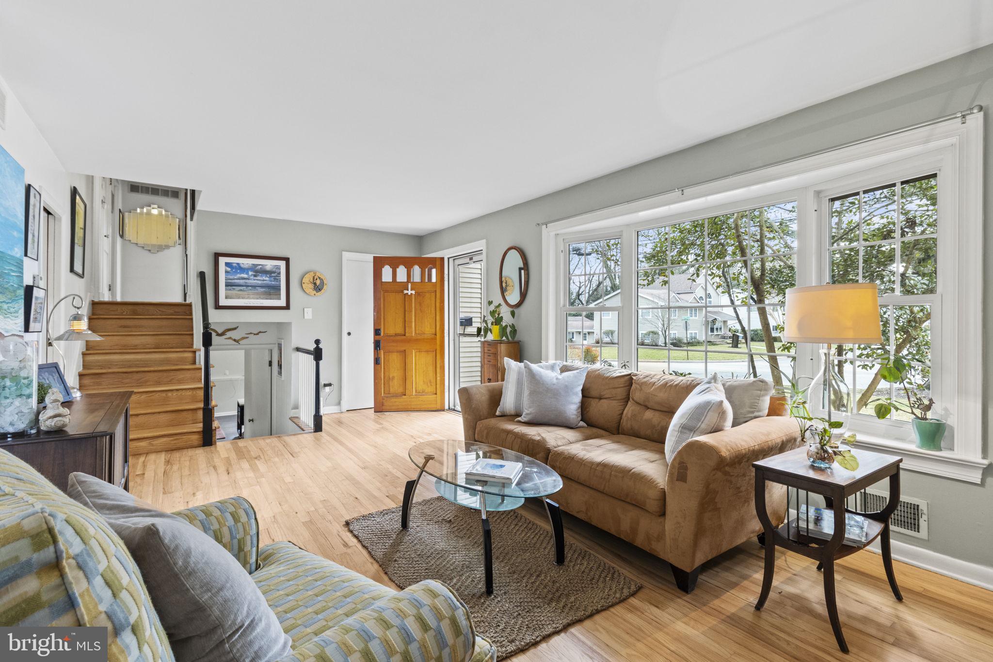 Natural light pours through oversized windows