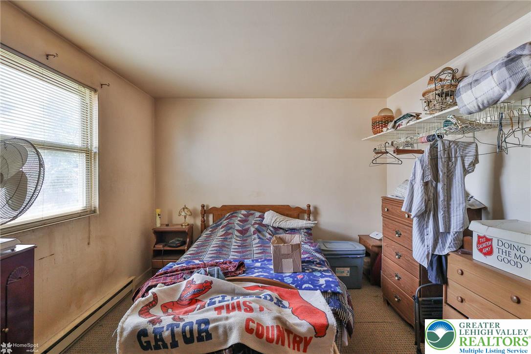 802 West Berwick Street Easton, PA 18042 - Photo 45 of 54 a bedroom with a bed and a window