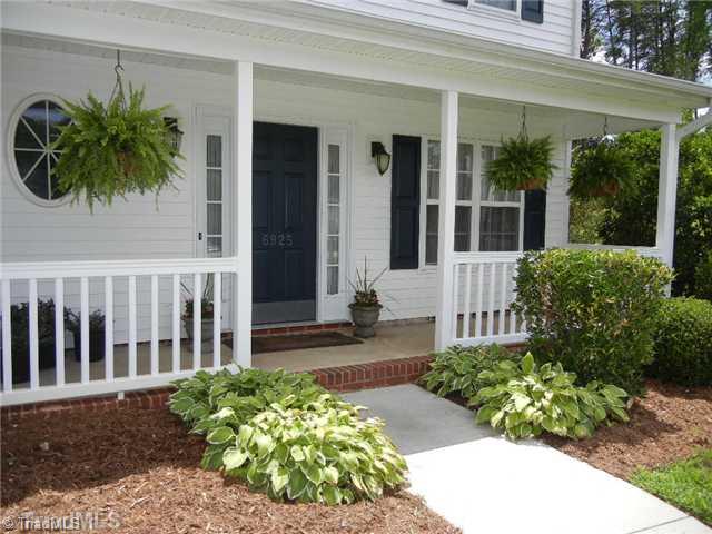 6925 Channel Forest Road Belews Creek, NC 27009 - Photo 14 of 16 Exterior Front. Enjoy the rocking chair front porch and attractive entry to your new home! Vinyl railings and siding make this exterior low maintenance.