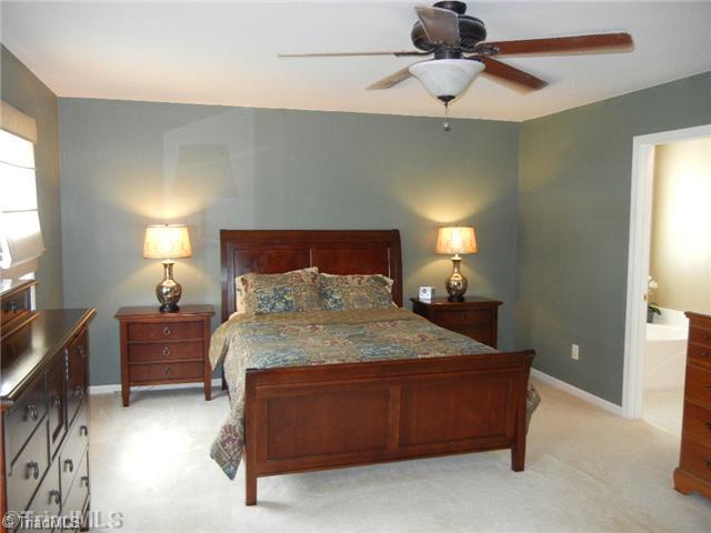 6925 Channel Forest Road Belews Creek, NC 27009 - Photo 8 of 16 Master Bedroom. Very large master bedroom with a upgraded ceiling fan and large walk-in closet!
