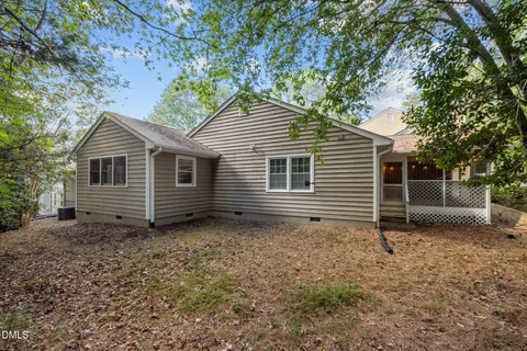 a side view of a house with a door