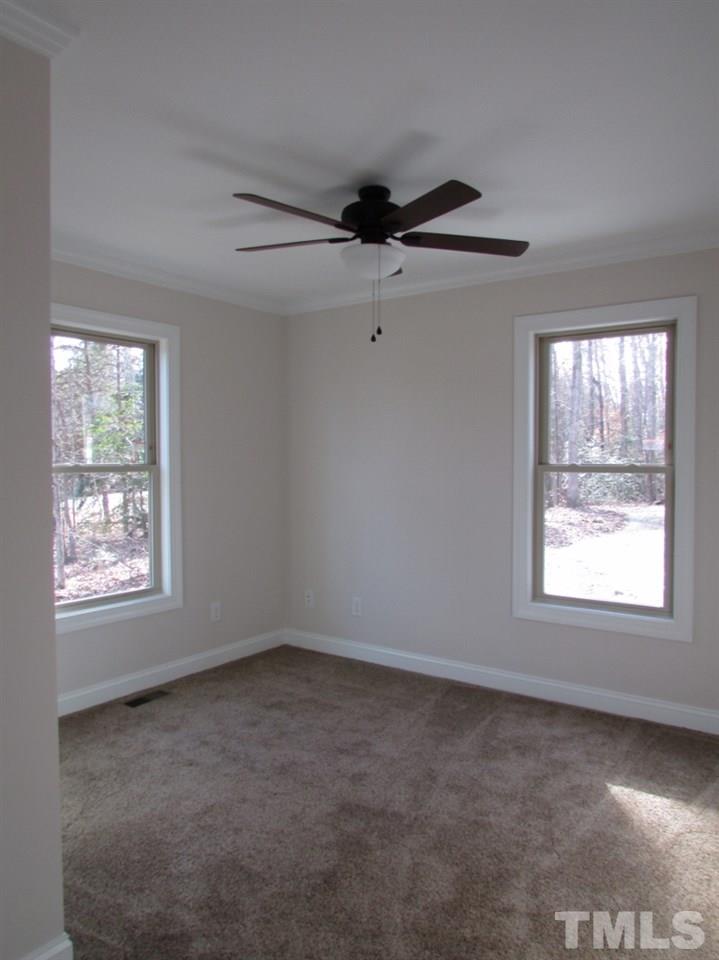 6477 Virgilina Road Roxboro, NC 27574 - Photo 15 of 20 an empty room with a window