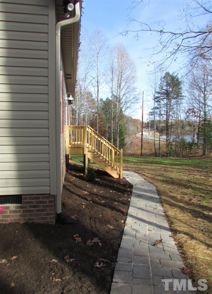 6477 Virgilina Road Roxboro, NC 27574 - Photo 18 of 20 a view of a pathway both side of building