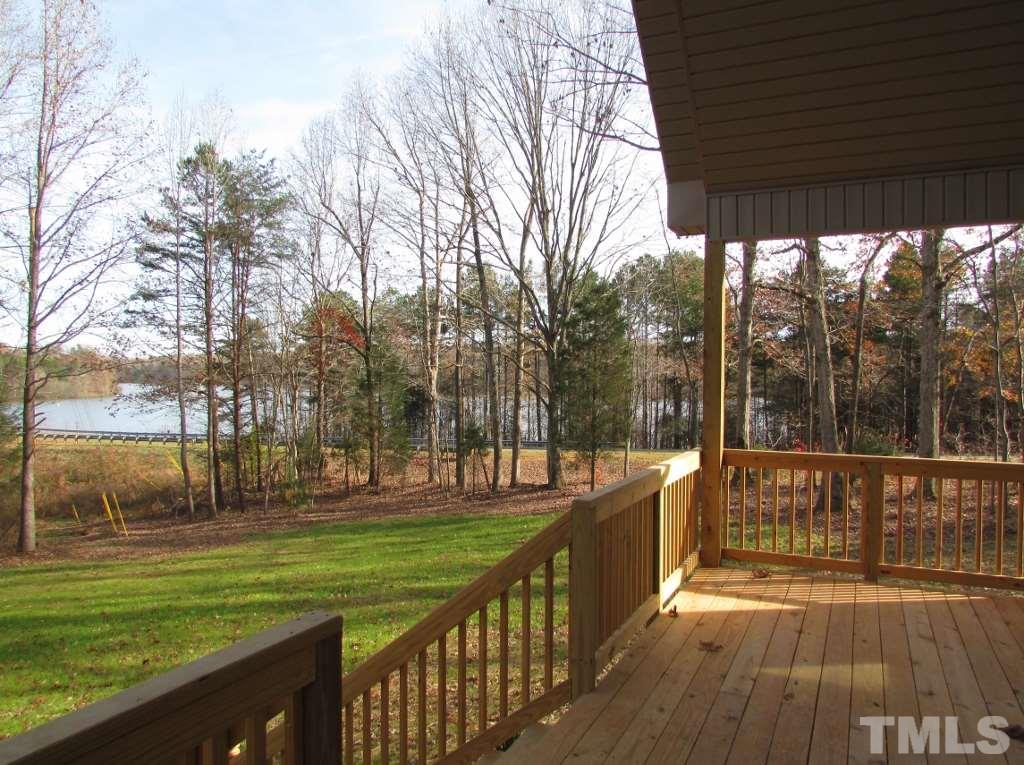 6477 Virgilina Road Roxboro, NC 27574 - Photo 3 of 20 a view of a swimming pool with a patio