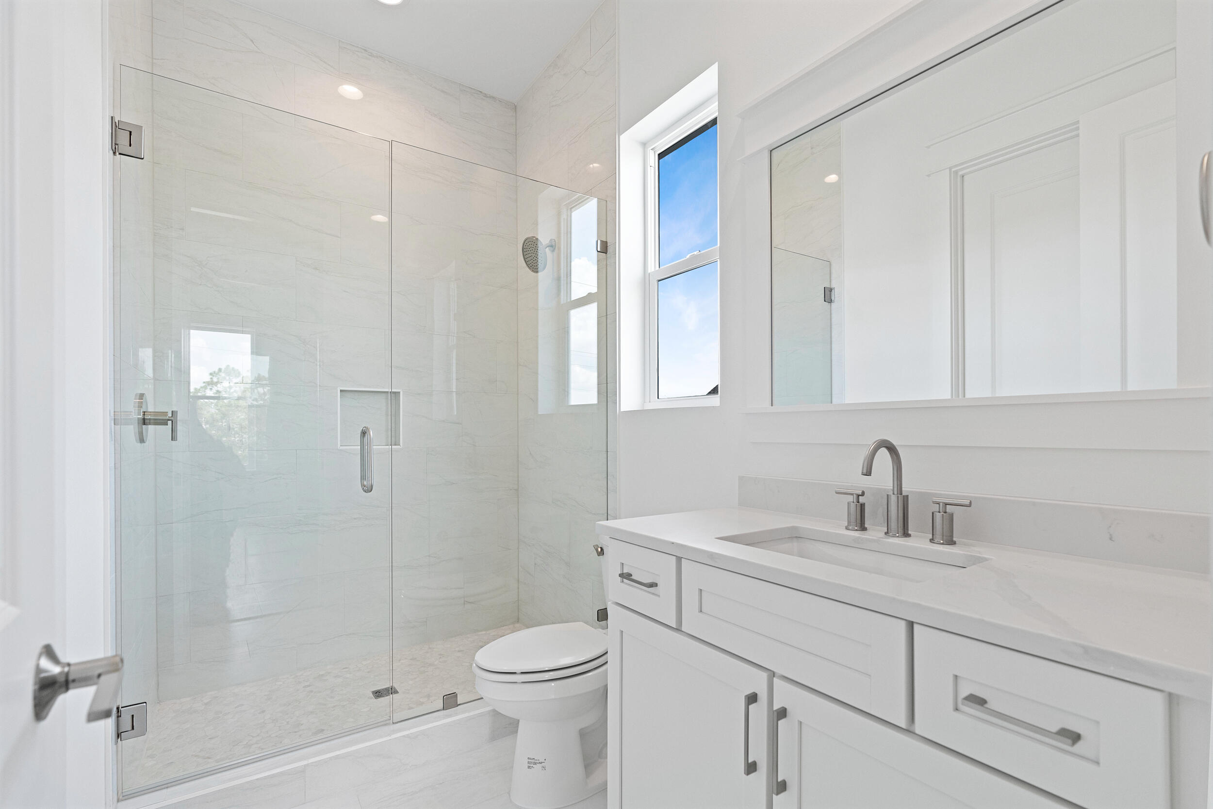 29 Pollard Cove, Unit LOT 3 Watersound, FL 32461 - Photo 34 of 69 a bathroom with a sink a toilet and shower