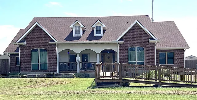 a front view of house with yard