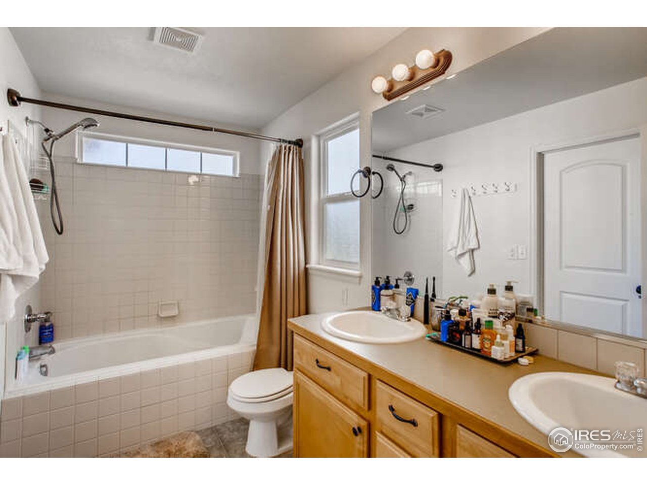7324 Ocean Ridge Street Wellington, CO 80549 - Photo 17 of 28 Owners bath also features a walk-in closet