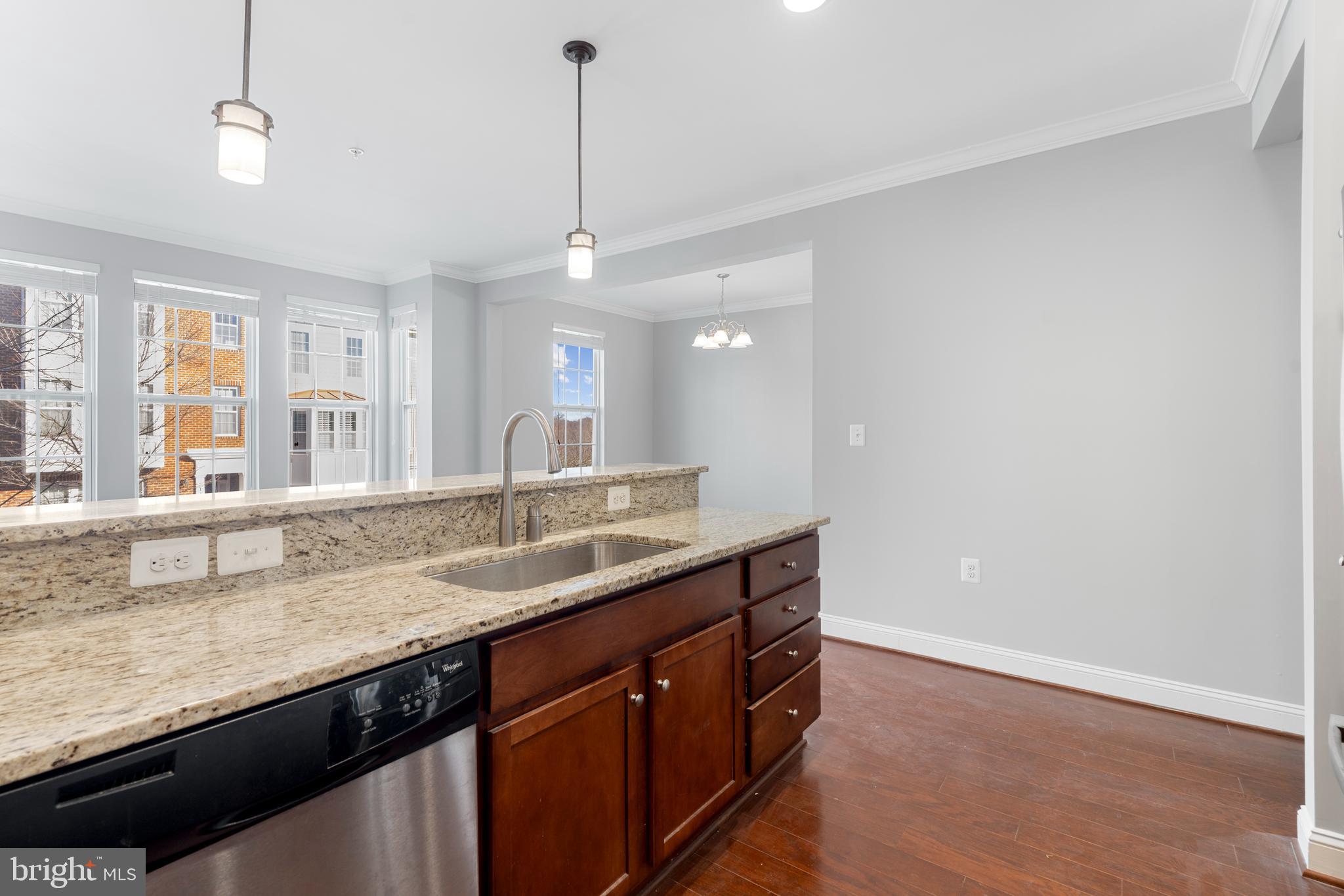 11246 Chase Street, Unit 141 Fulton, MD 20759 - Photo 12 of 37 a bathroom with a granite countertop sink and a large mirror
