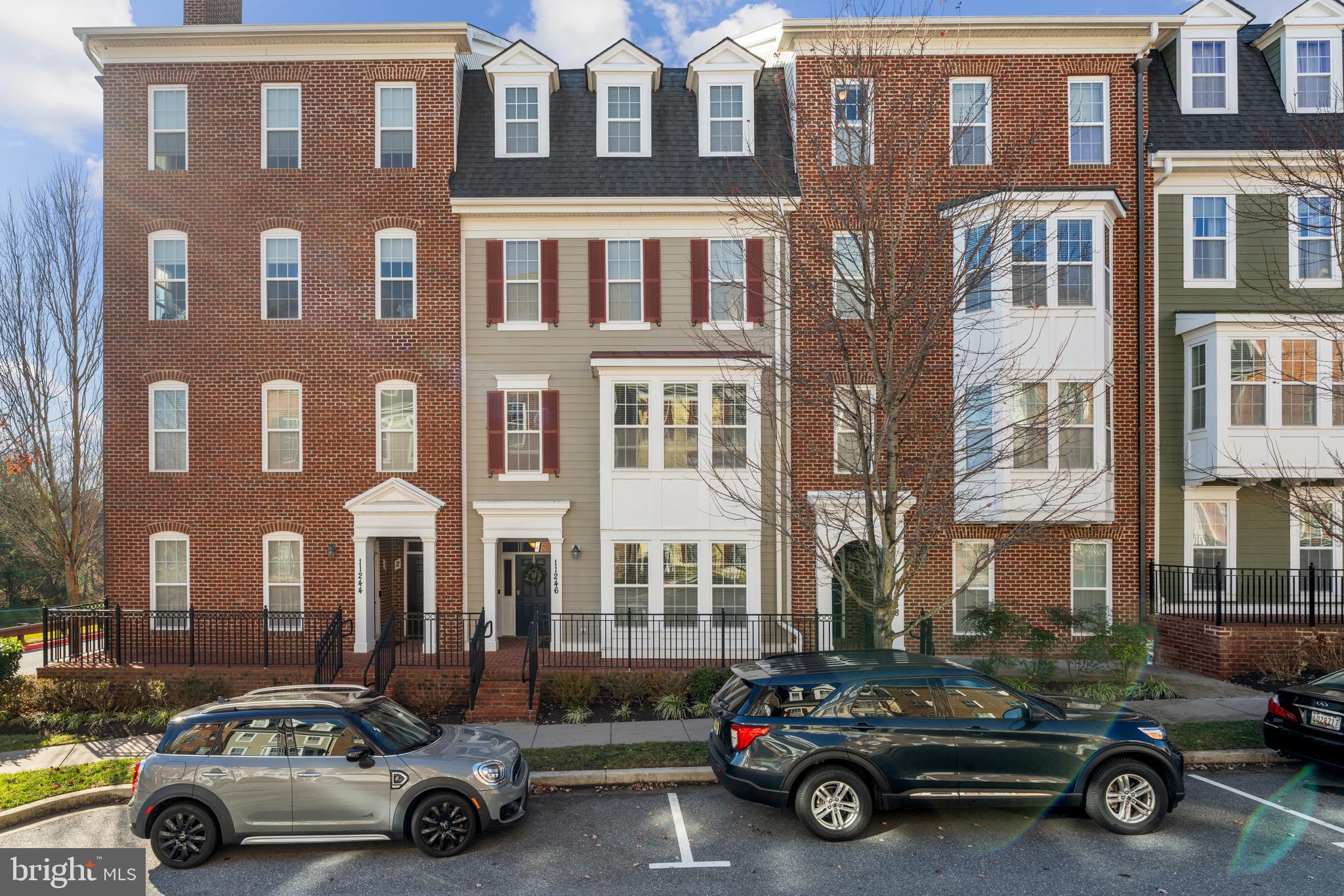 11246 Chase Street, Unit 141 Fulton, MD 20759 - Photo 2 of 37 a car parked in front of a building