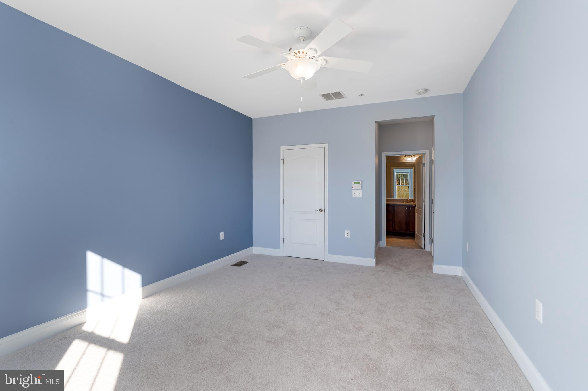 11246 Chase Street, Unit 141 Fulton, MD 20759 - Photo 25 of 37 a view of an empty room with a window