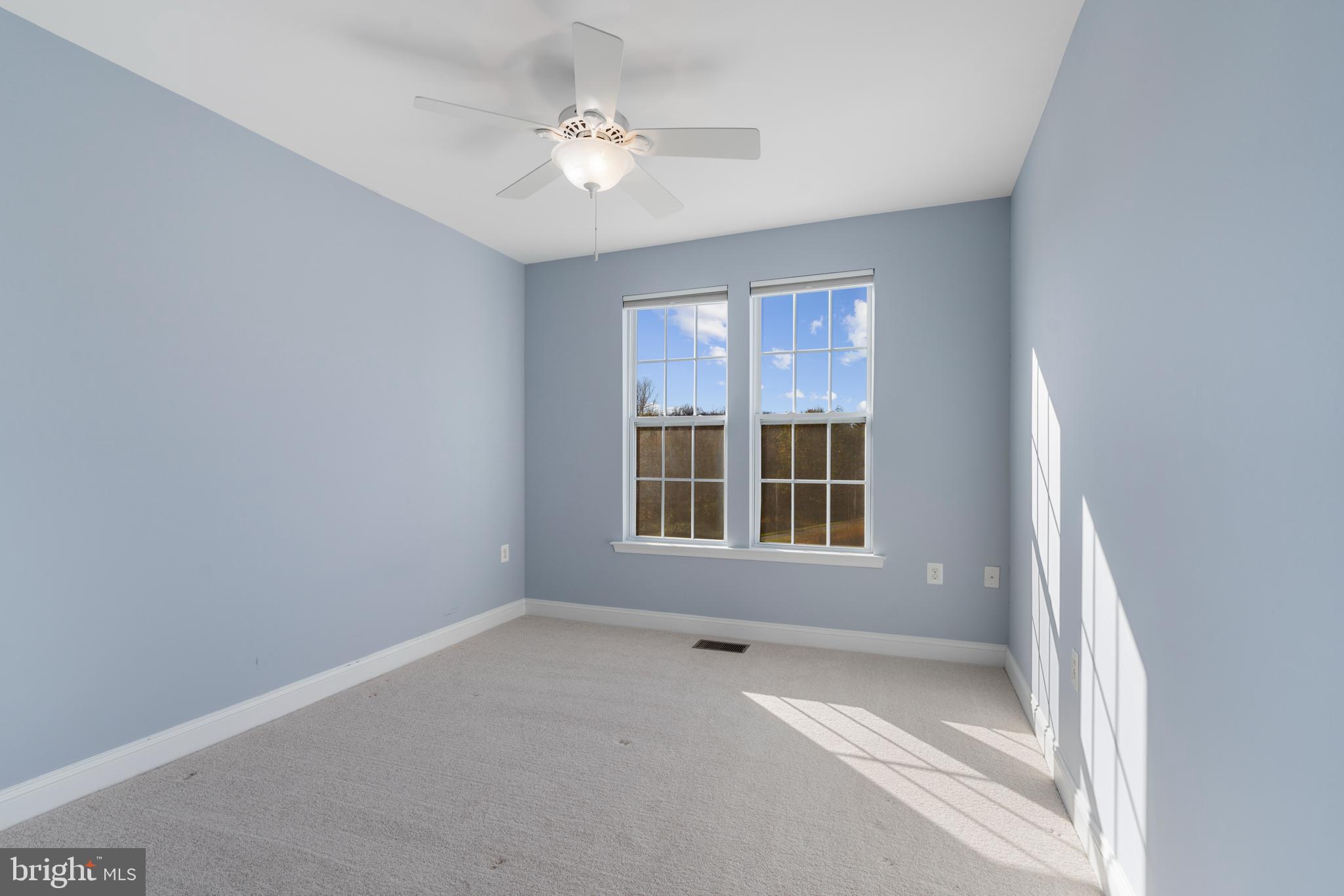 11246 Chase Street, Unit 141 Fulton, MD 20759 - Photo 29 of 37 a view of an empty room with a window