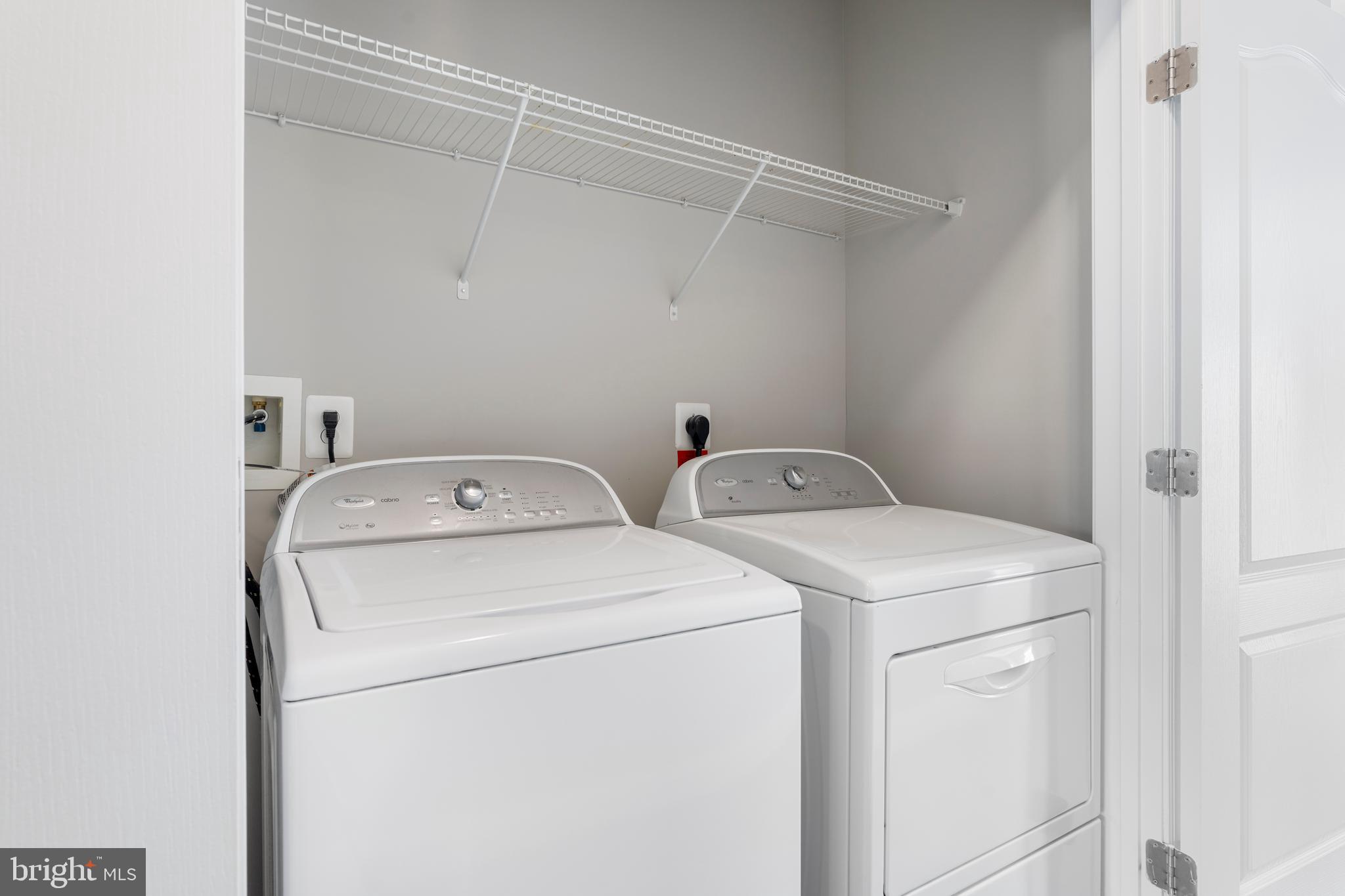 11246 Chase Street, Unit 141 Fulton, MD 20759 - Photo 33 of 37 a utility room with dryer and washer