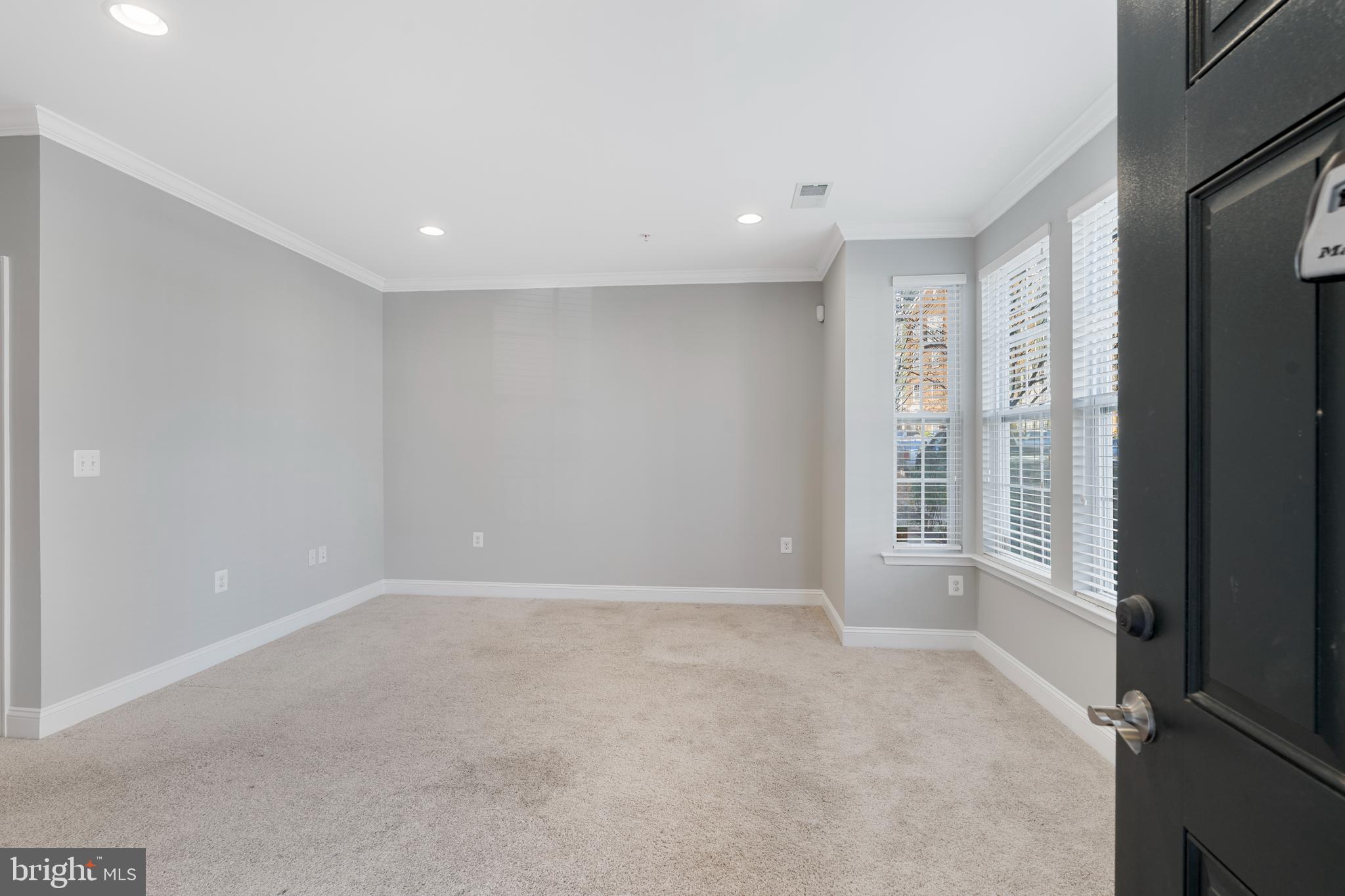 11246 Chase Street, Unit 141 Fulton, MD 20759 - Photo 6 of 37 a view of an empty room with a window