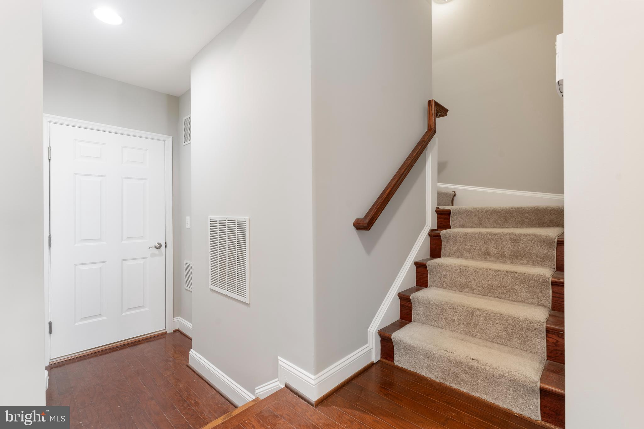 11246 Chase Street, Unit 141 Fulton, MD 20759 - Photo 10 of 37 a view of staircase with wooden floor and stairs