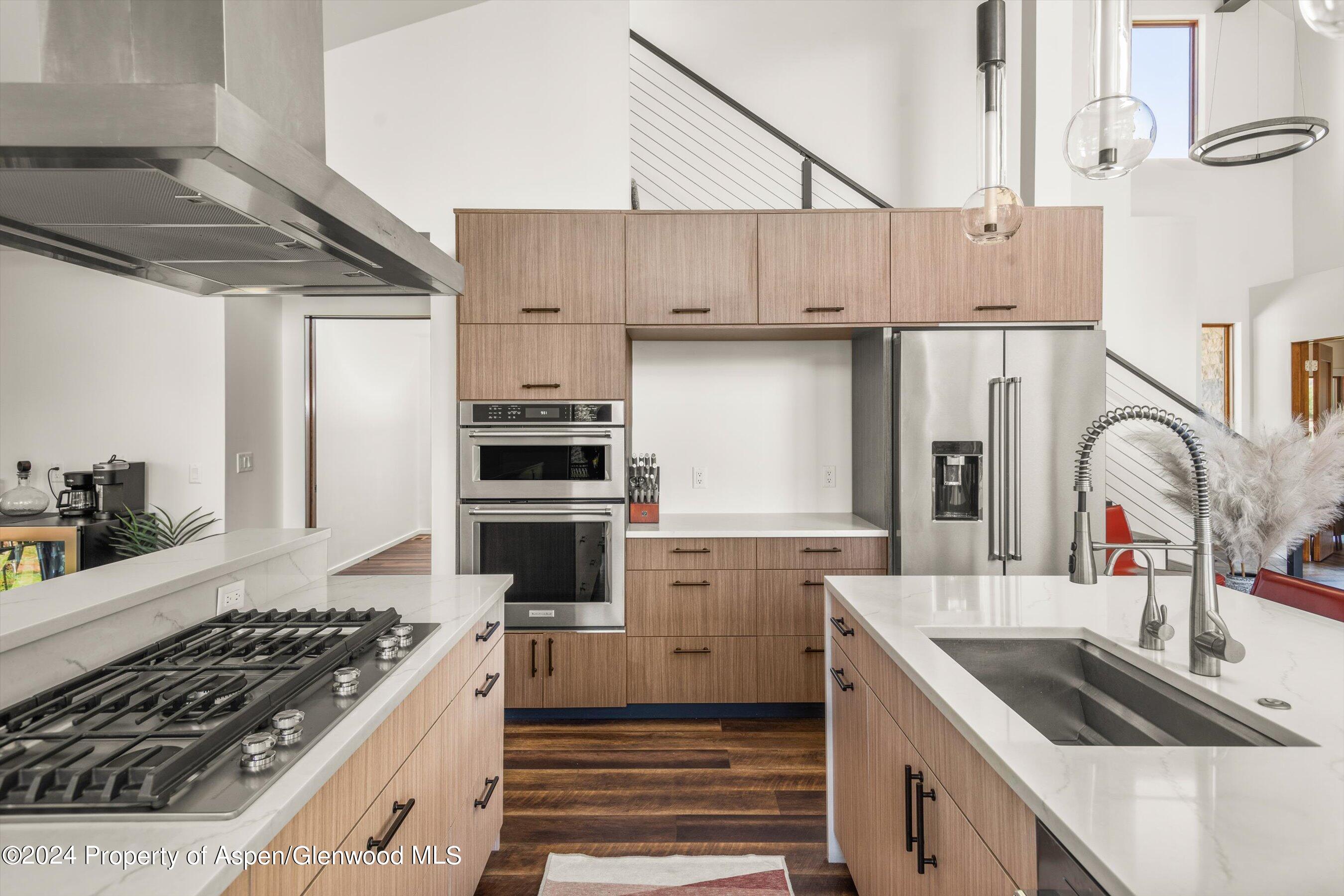 16 Puma Carbondale, CO 81623 - Photo 8 of 21 a kitchen with white cabinets and appliances
