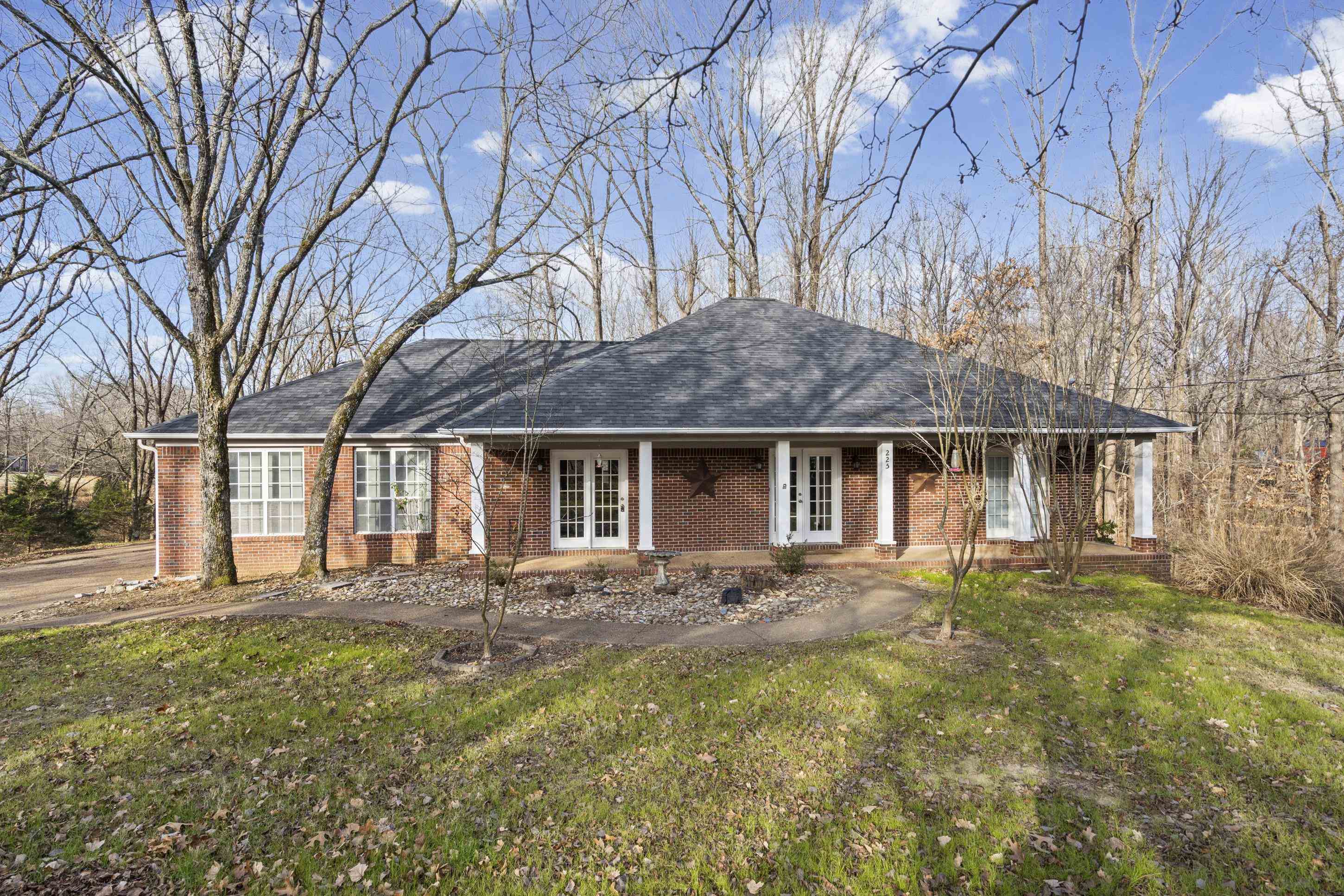 225 Poplar Grove Church Road Drummonds, TN 38023 - Photo 1 of 30 front view of a house with a yard