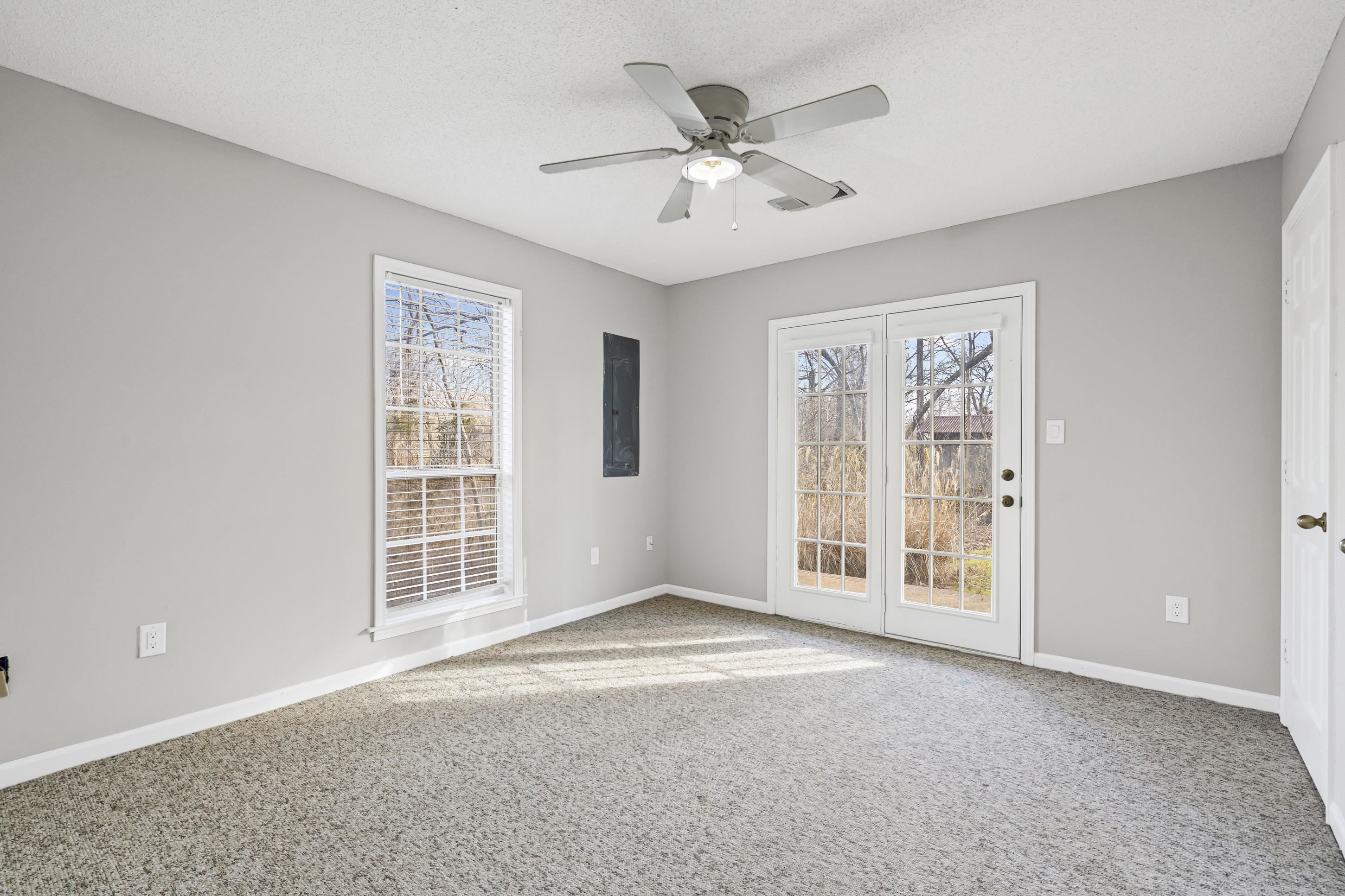 225 Poplar Grove Church Road Drummonds, TN 38023 - Photo 19 of 30 an empty room with windows and fan