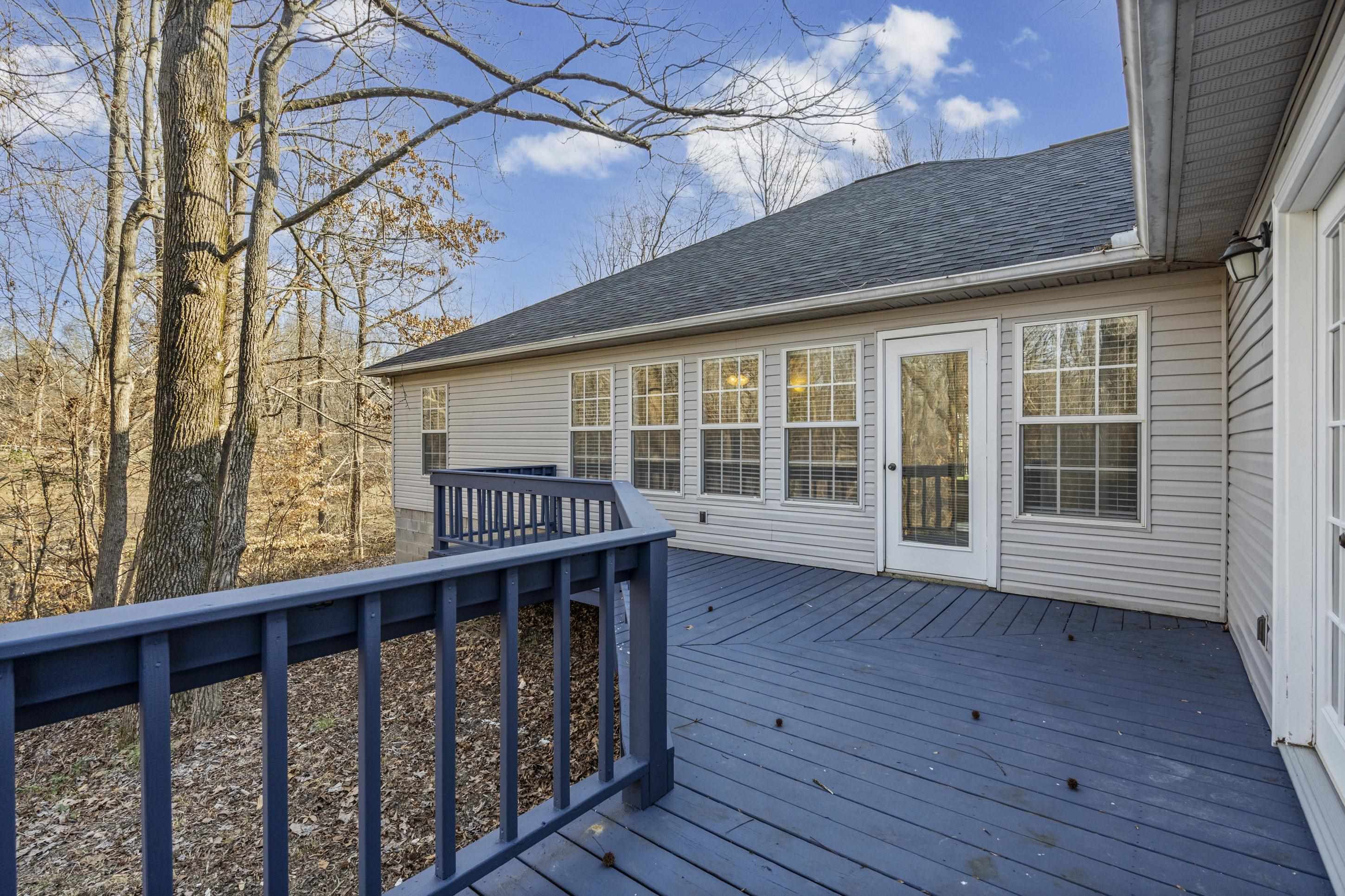 225 Poplar Grove Church Road Drummonds, TN 38023 - Photo 21 of 30 a view of wooden deck
