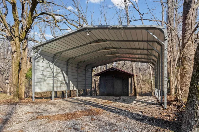 a view of entrance gate of a house