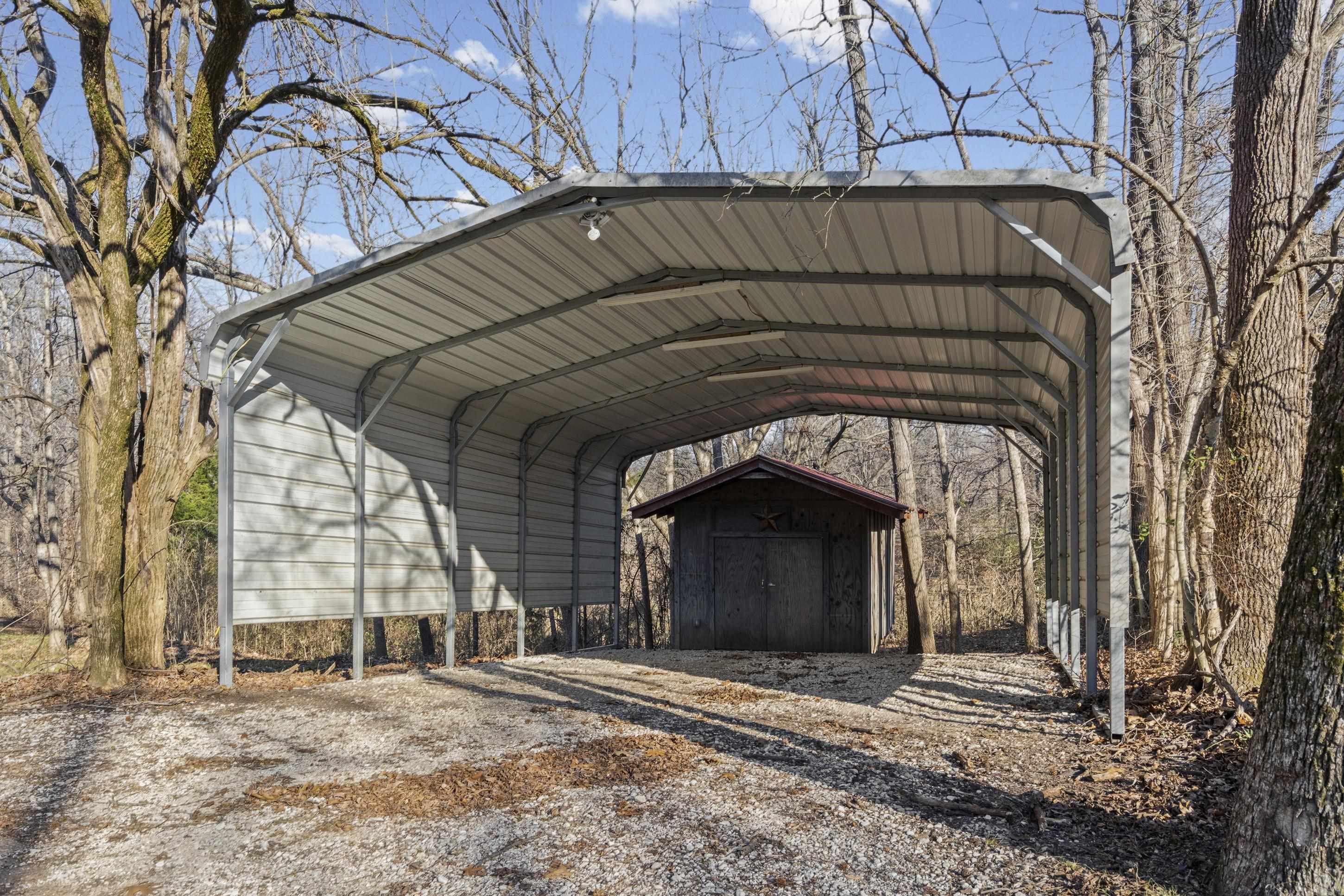 225 Poplar Grove Church Road Drummonds, TN 38023 - Photo 23 of 30 a view of entrance gate of a house
