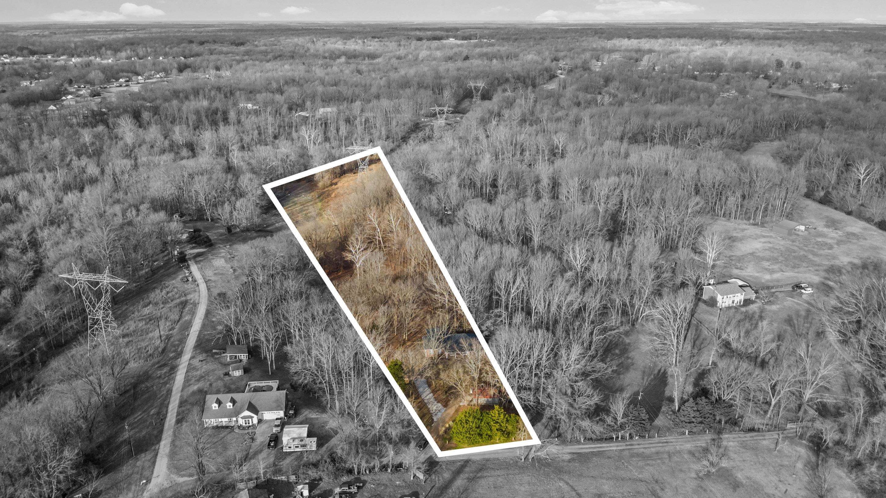 225 Poplar Grove Church Road Drummonds, TN 38023 - Photo 25 of 30 a view of a backyard with mountain view