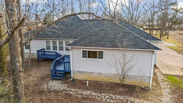 a backyard of a house with seating space