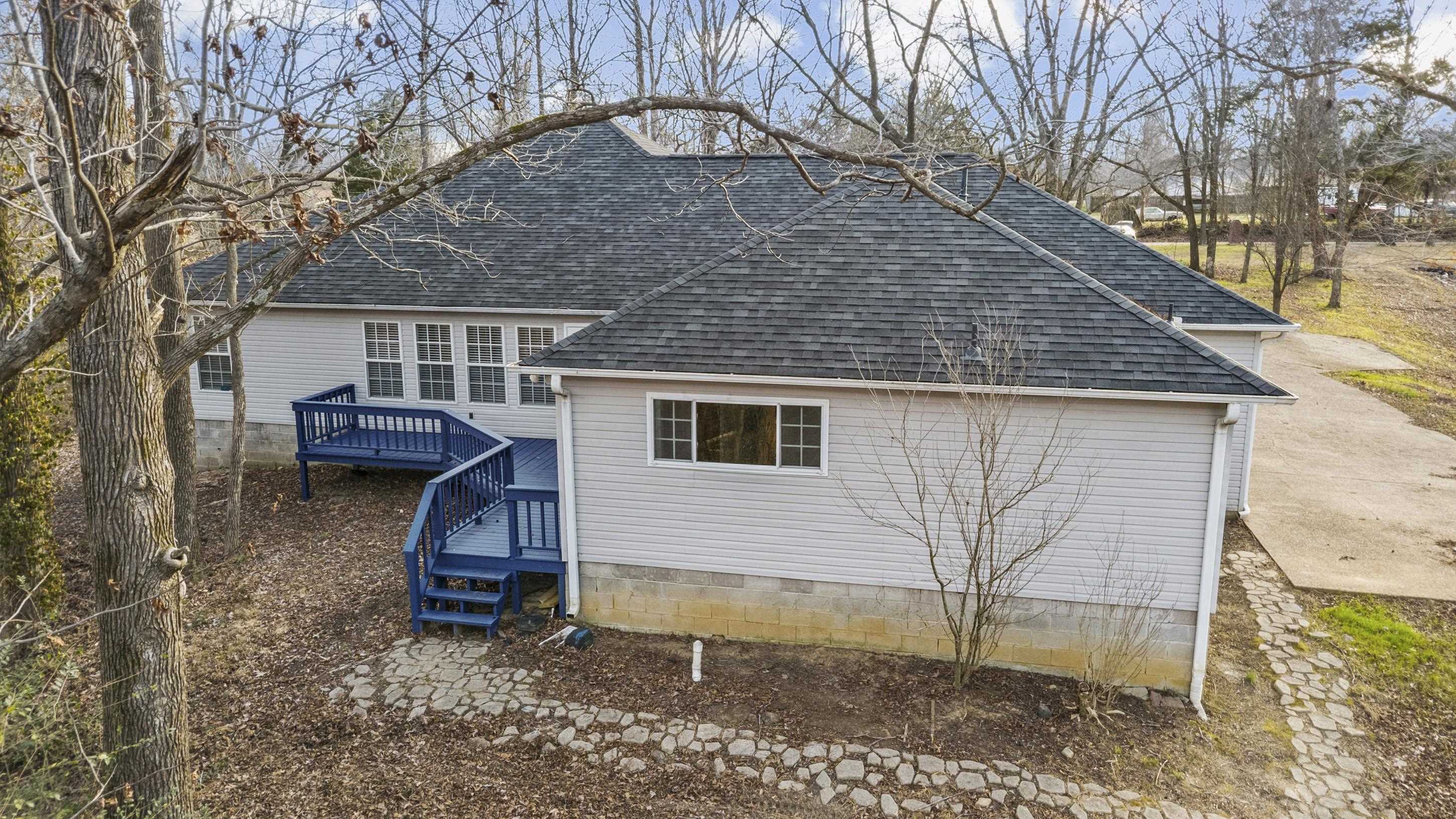 225 Poplar Grove Church Road Drummonds, TN 38023 - Photo 28 of 30 a backyard of a house with seating space