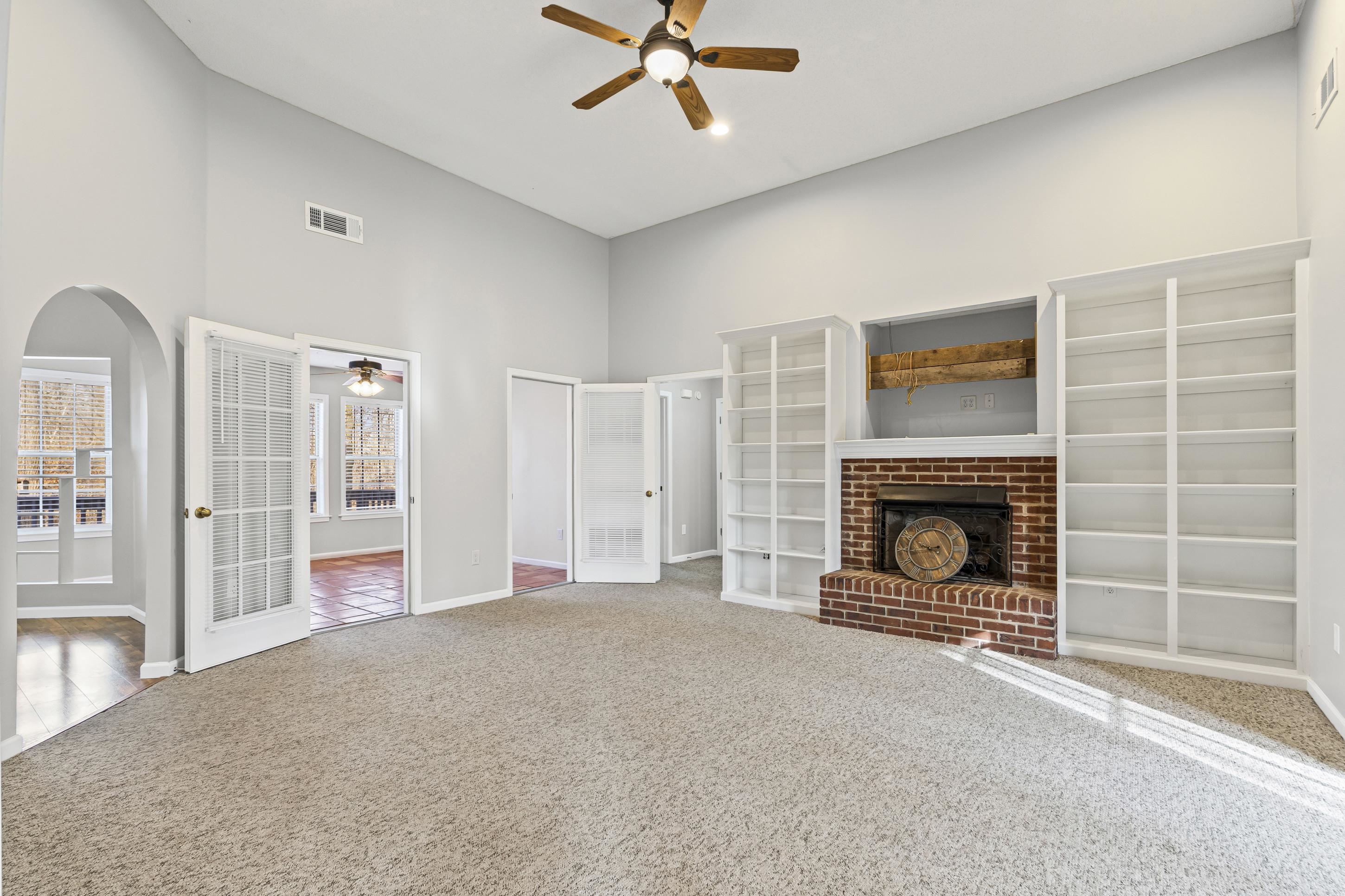 225 Poplar Grove Church Road Drummonds, TN 38023 - Photo 3 of 30 a living room with furniture and a fireplace