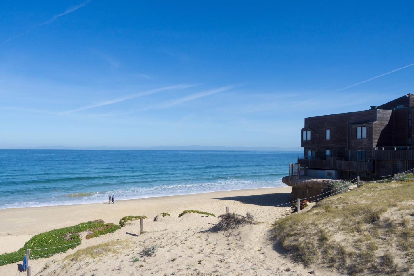 1 Surf Way, Unit 228 Monterey, CA 93940 - Photo 10 of 13 a view of a closet with an ocean view