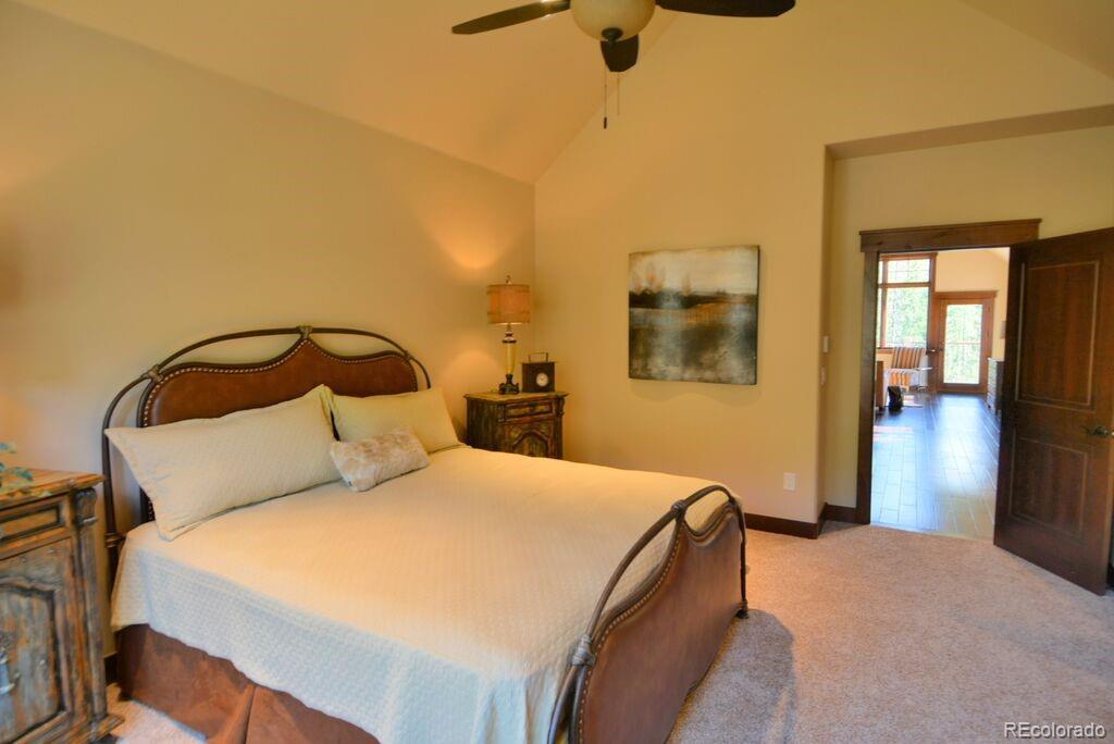 705 Independence Road, Unit 12A Keystone, CO 80435 - Photo 19 of 25 a bedroom with a bed and a mirror