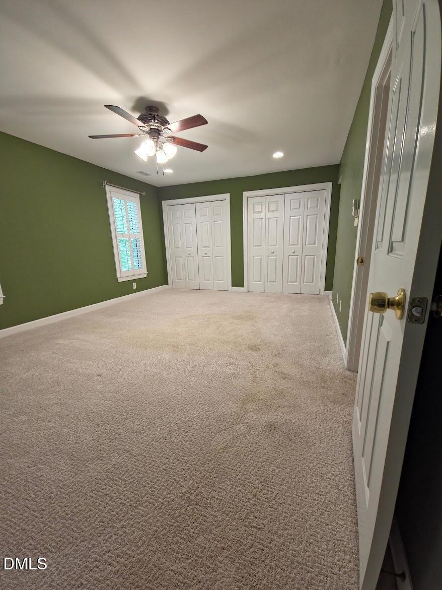 6844 Gloucester Road Raleigh, NC 27612 - Photo 14 of 25 a view of an empty room with a window