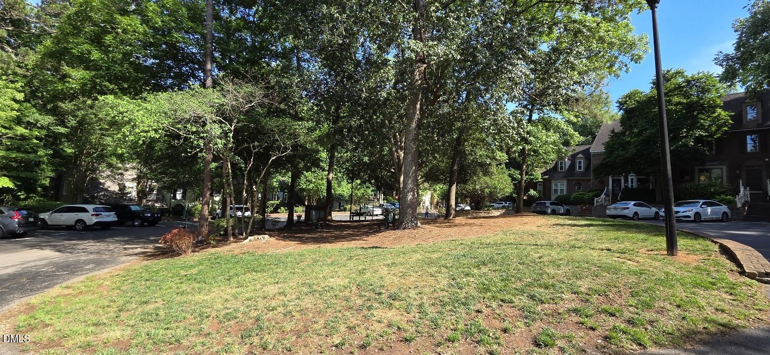 6844 Gloucester Road Raleigh, NC 27612 - Photo 25 of 25 a view of a park with swings and a trees