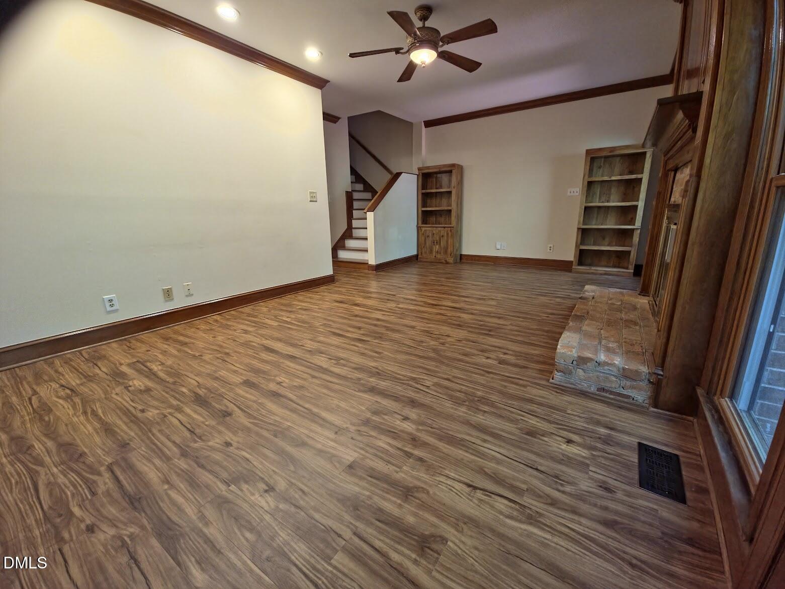 6844 Gloucester Road Raleigh, NC 27612 - Photo 8 of 25 a view of an empty room with a window