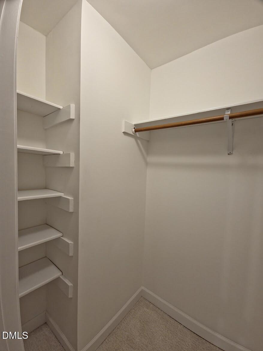 6844 Gloucester Road Raleigh, NC 27612 - Photo 10 of 25 a view of an empty walk in closet