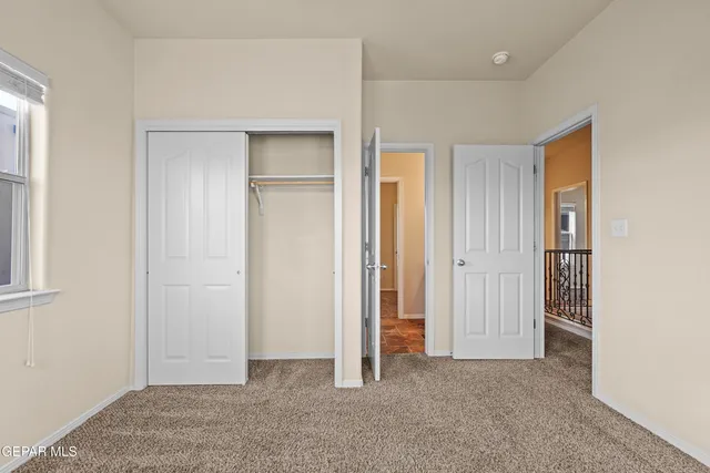 a bathroom with a toilet and a bathtub