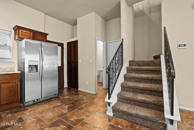 a view of a hallway with a room