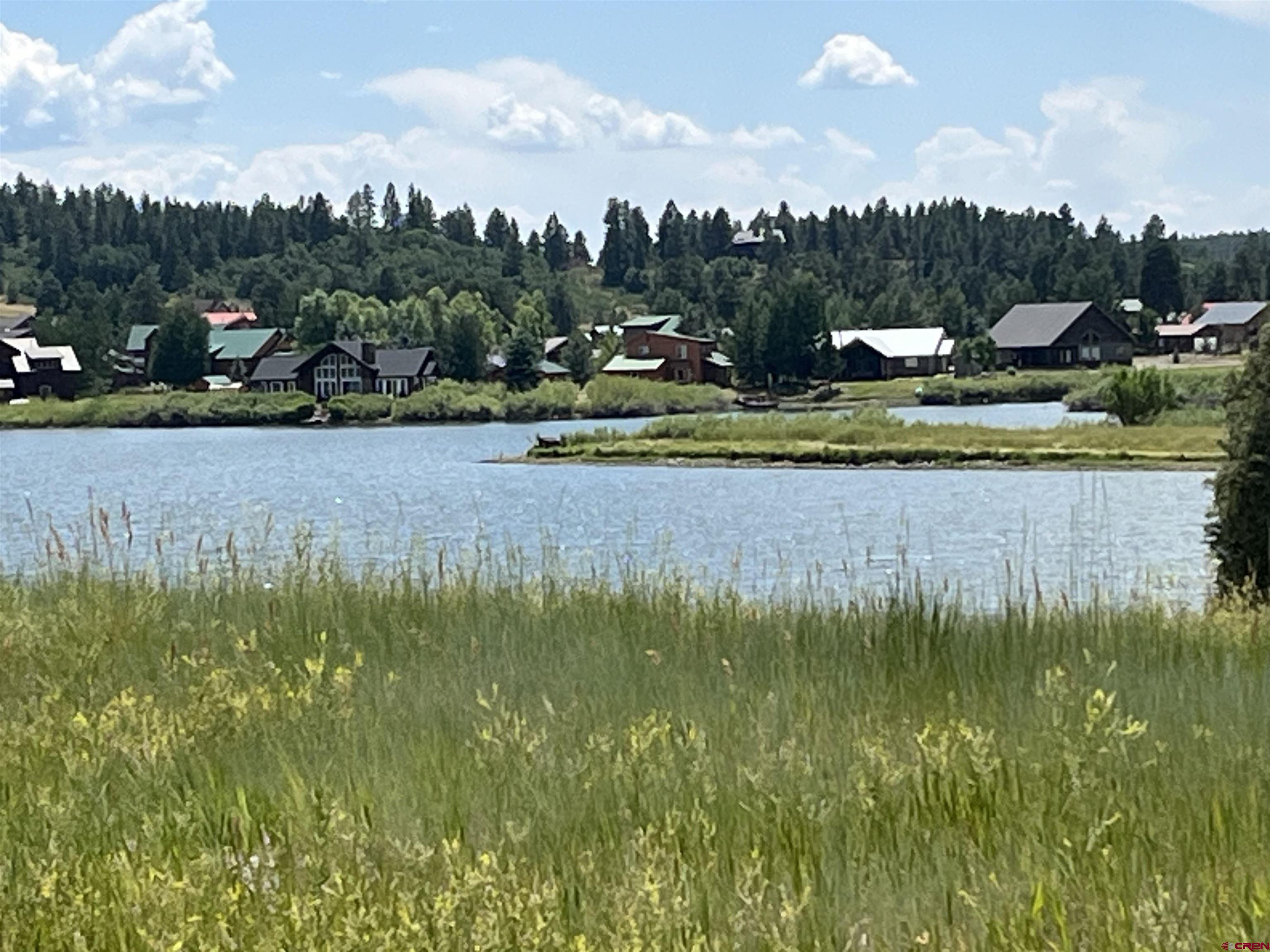 a view of a lake with houses