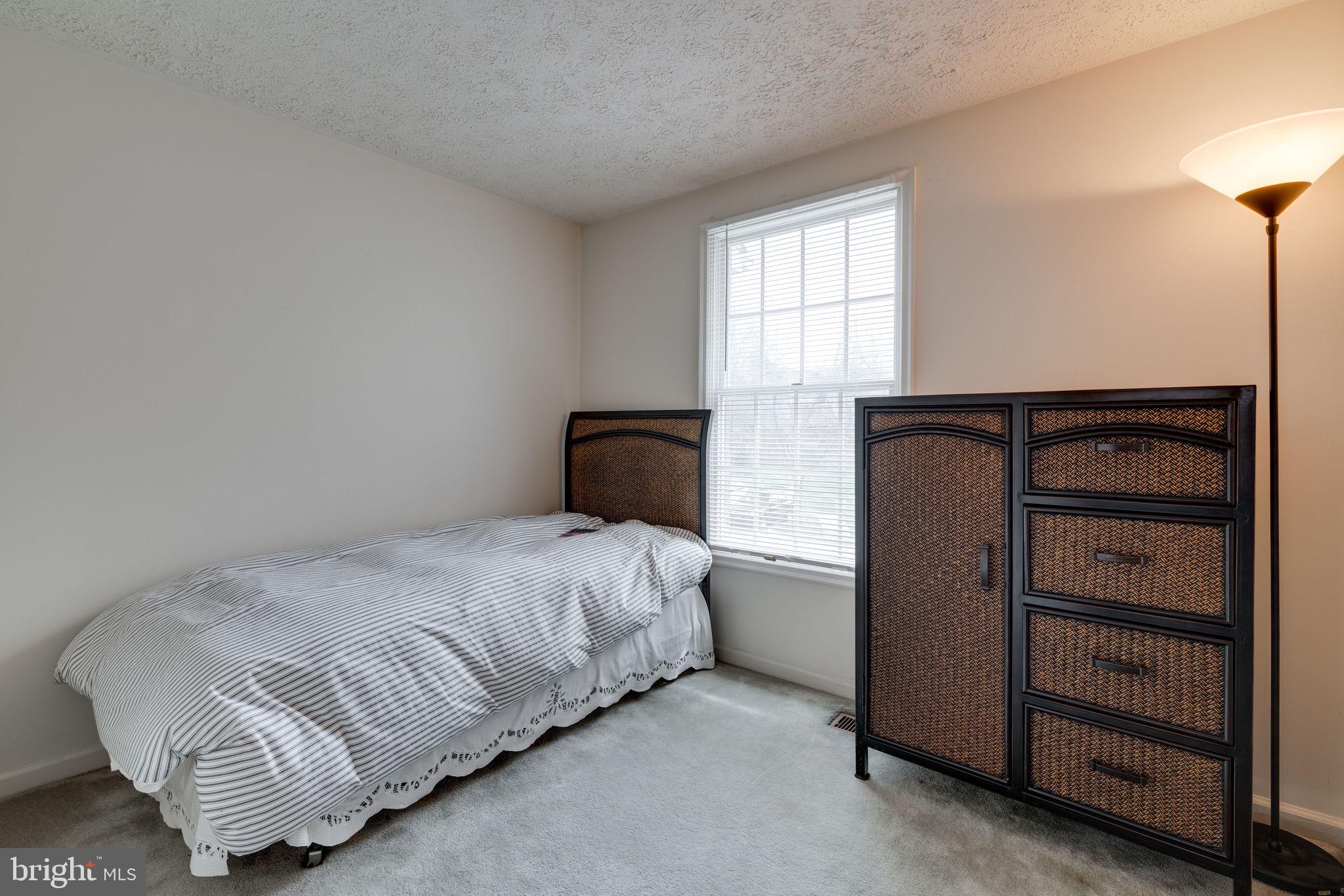 7548 Aspenpark Road Lorton, VA 22079 - Photo 12 of 20 Bright 2nd bedroom with blooming tree view
