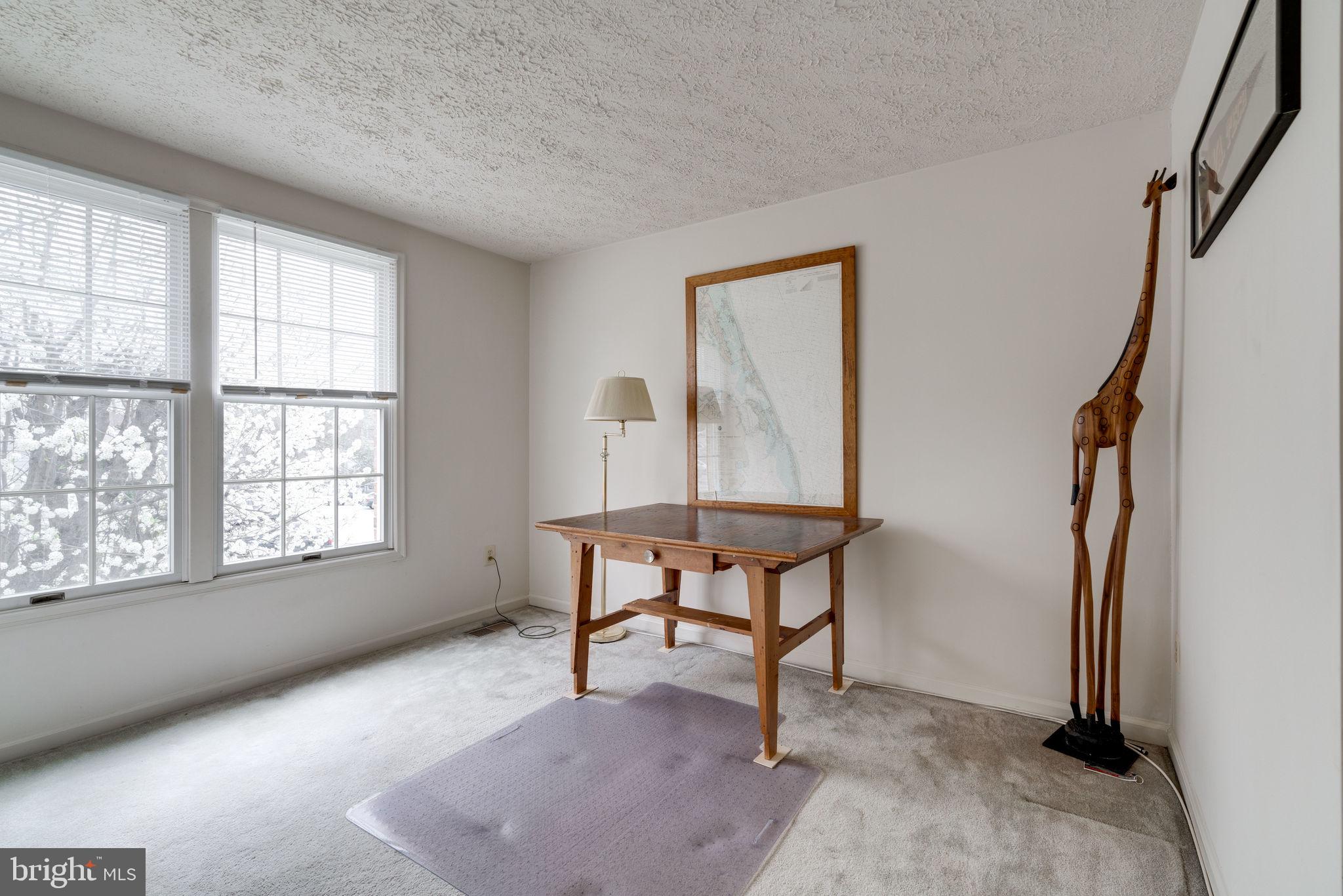 7548 Aspenpark Road Lorton, VA 22079 - Photo 13 of 20 Bright 3rd bedroom with blooming tree view