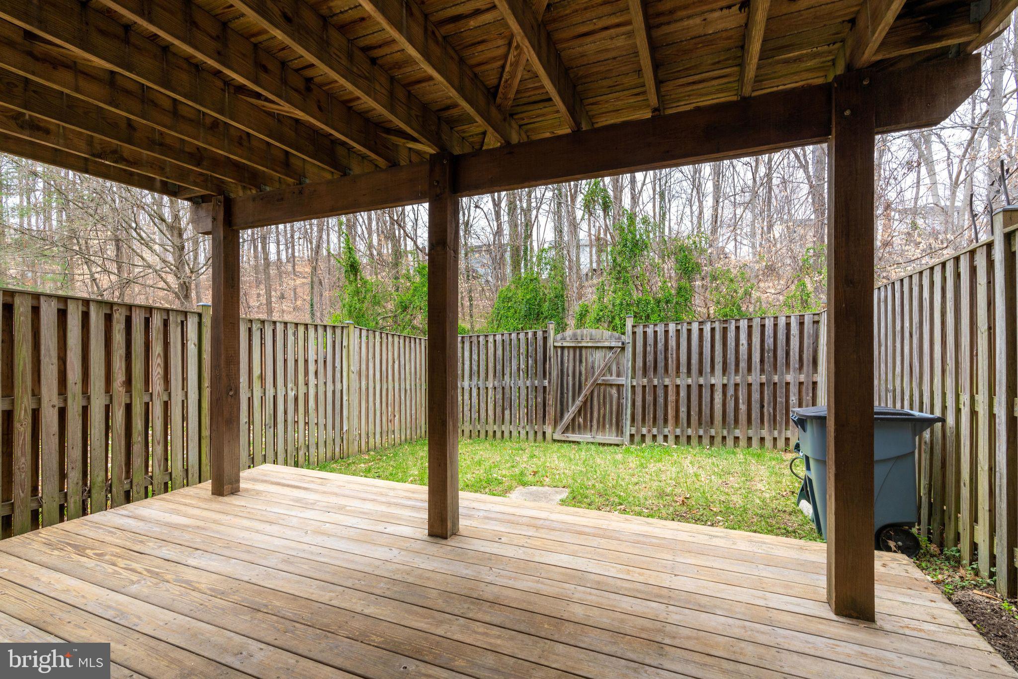 7548 Aspenpark Road Lorton, VA 22079 - Photo 19 of 20 Dual deck, yard, gated fence