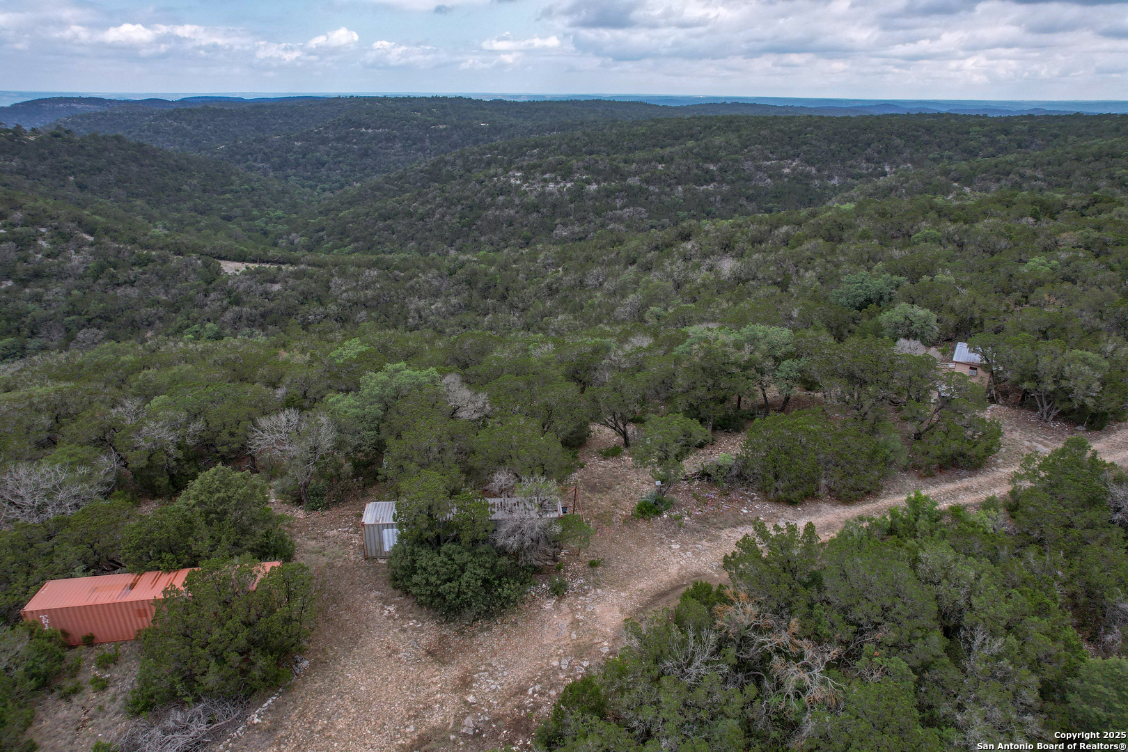 824 South Pinon Loop Camp Wood, TX 78833 - Photo 13 of 39 an aerial view of residential houses with outdoor space and trees