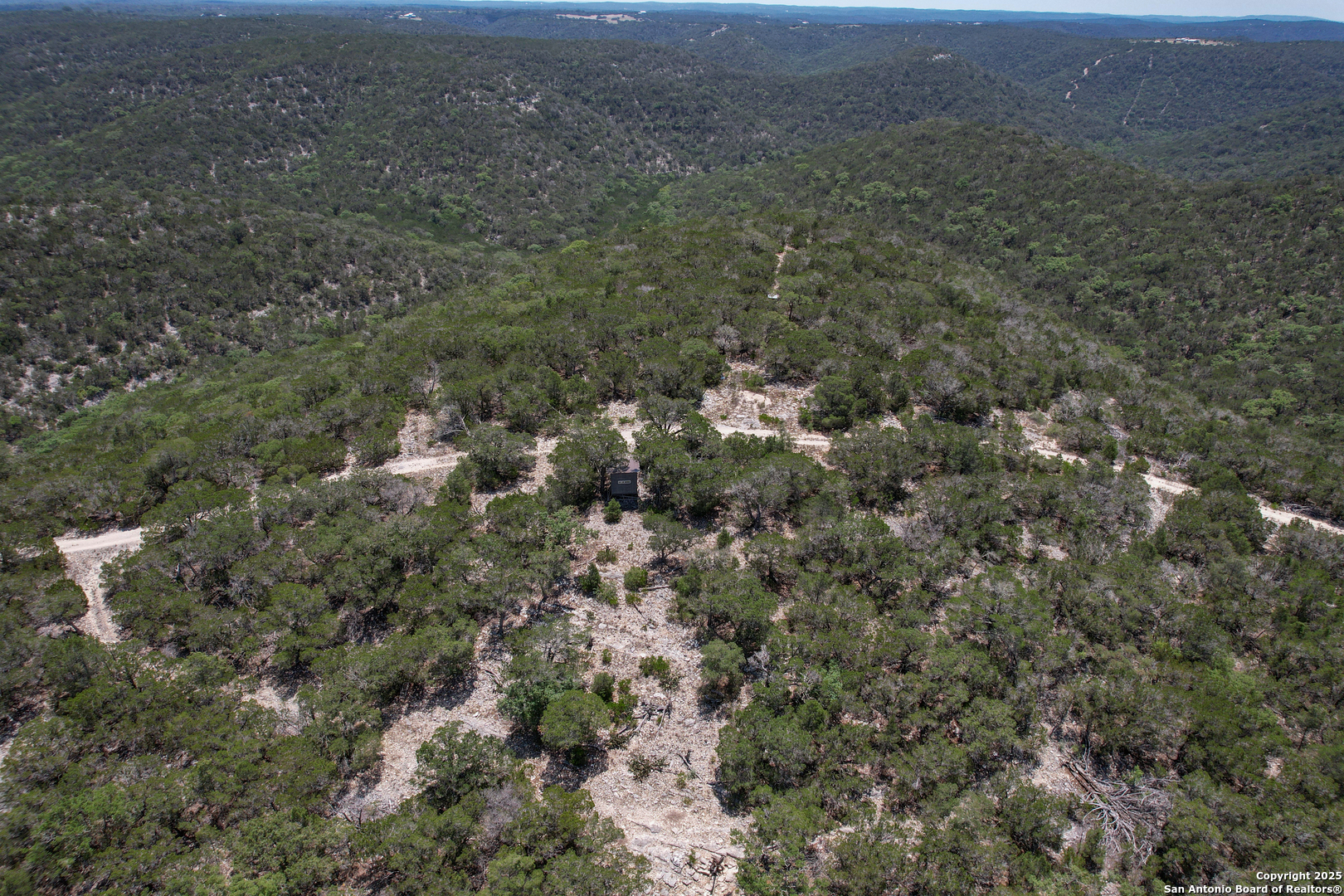 824 South Pinon Loop Camp Wood, TX 78833 - Photo 16 of 39 a view of a big yard with lots of bushes