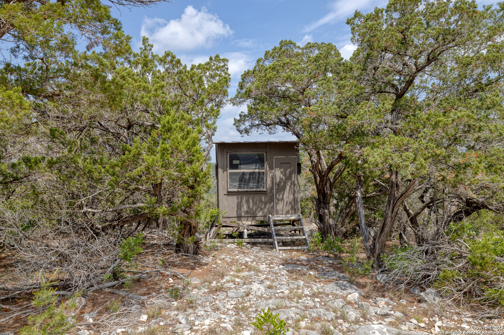 824 South Pinon Loop Camp Wood, TX 78833 - Photo 20 of 39 a view of a chairs in backyard of the house